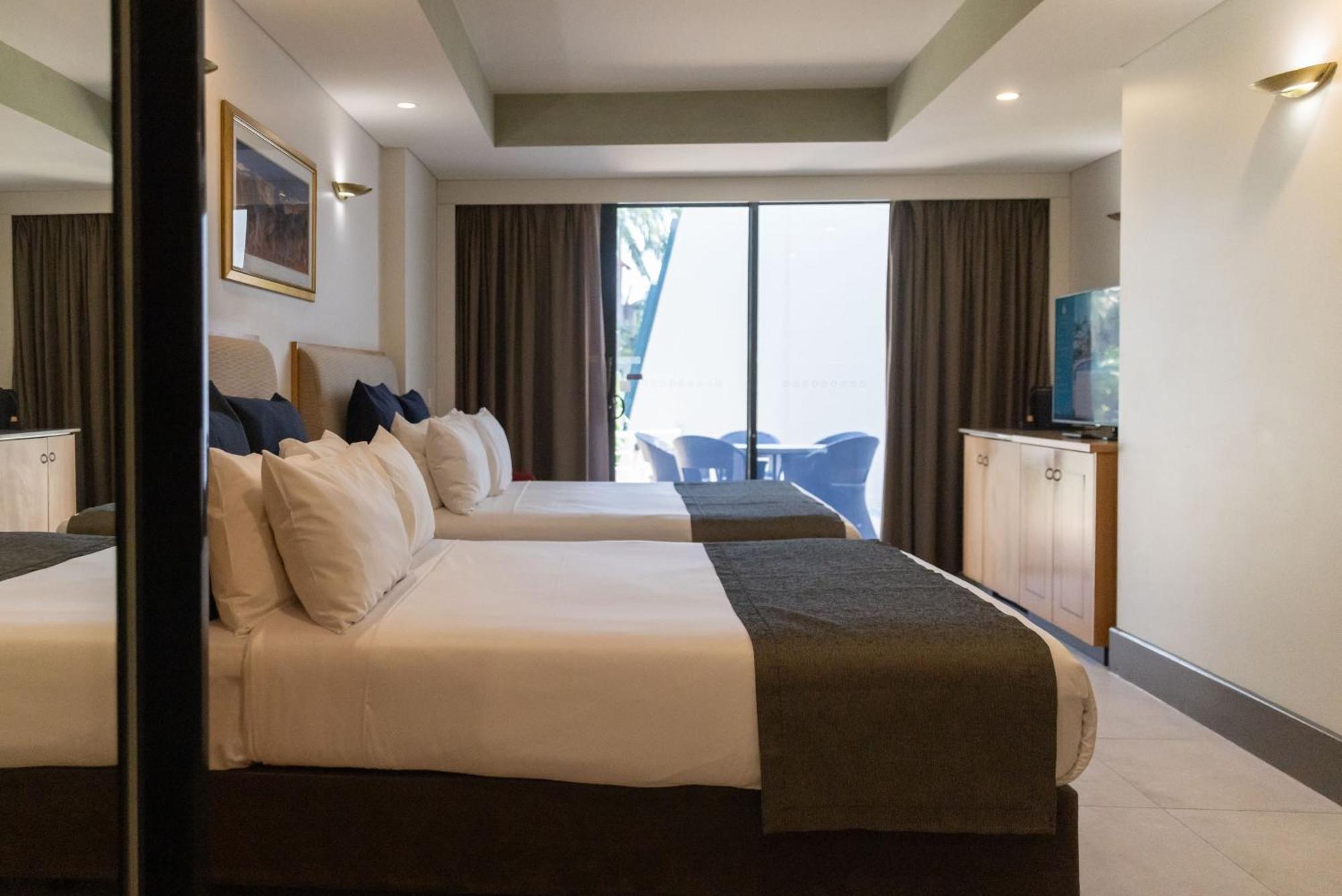 مندل بيتش كاسينو ومنتجع داروين المظهر الخارجي الصورة A room at the hotel
