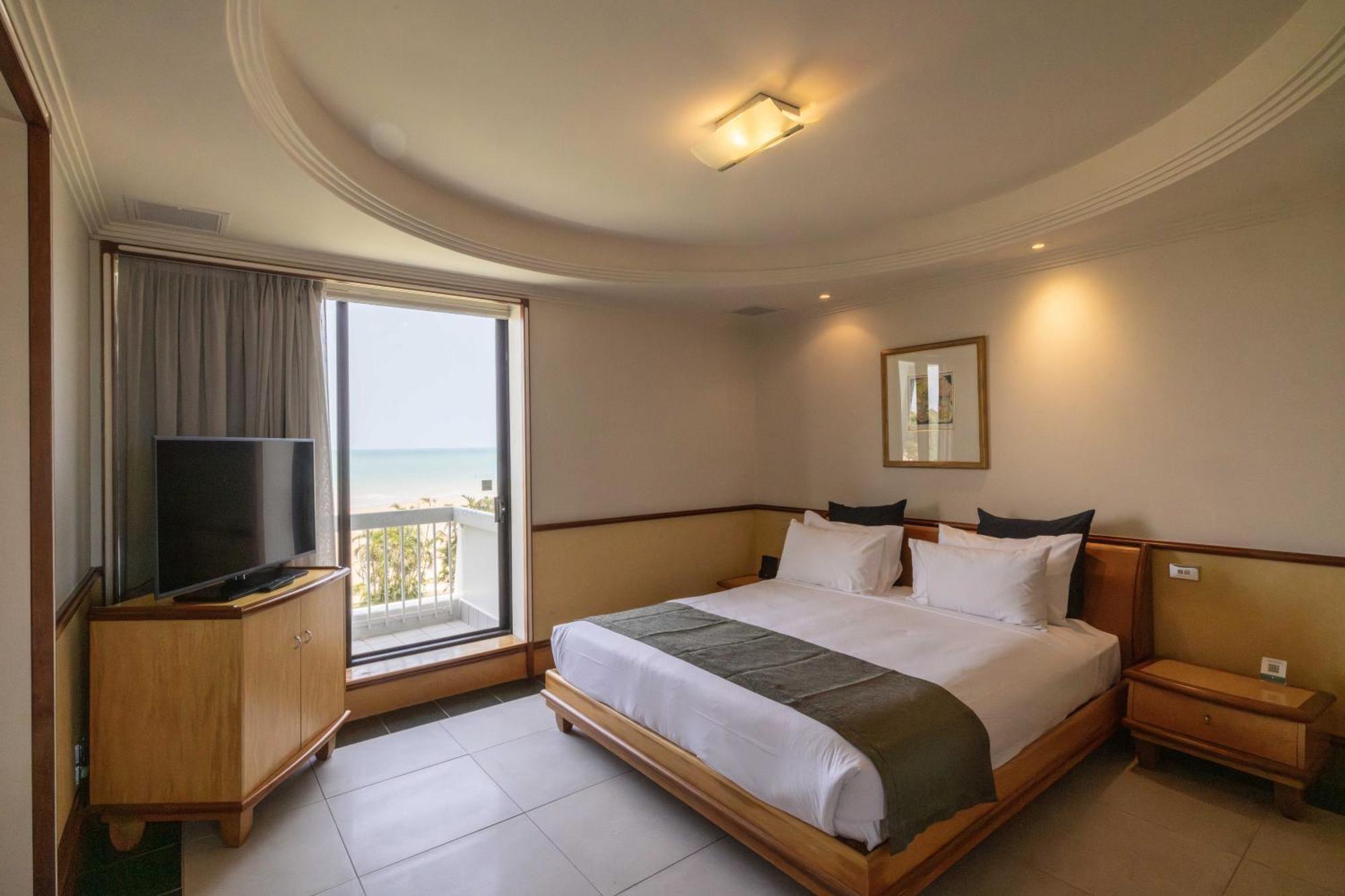 مندل بيتش كاسينو ومنتجع داروين المظهر الخارجي الصورة A bedroom at the hotel