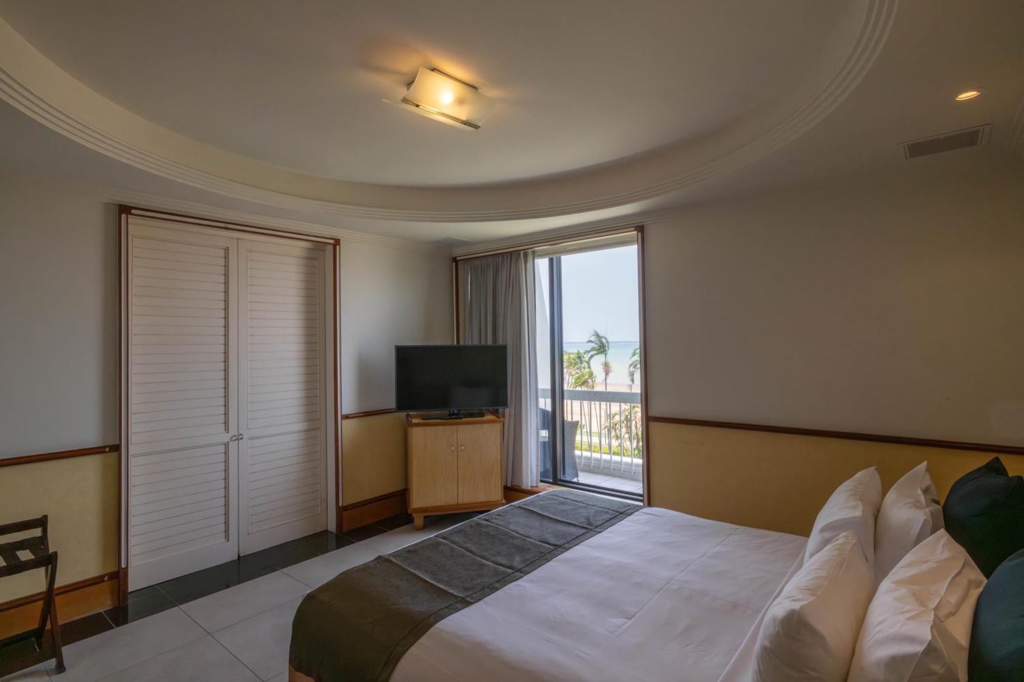 مندل بيتش كاسينو ومنتجع داروين المظهر الخارجي الصورة A bedroom at the hotel